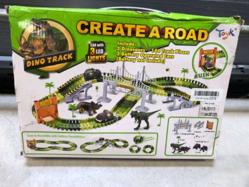 Photo 2 of Dinosaur Toys,Create A Dinosaur World Road Race,Flexible Track Playset and 2 pcs Cool Dinosaur car for 3 4 5 6 Year & Up Old boy Girls Best Gift Green