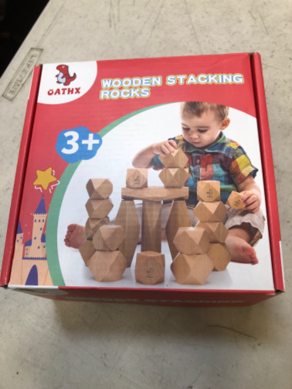 Photo 1 of wooden stacking rocks