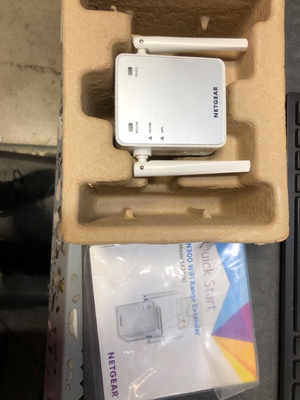 Photo 2 of NETGEAR Wi-Fi Range Extender EX2700 - Coverage Up to 800 Sq Ft and 10 devices with N300 Wireless Signal Booster & Repeater (Up to 300Mbps Speed), and Compact Wall Plug Design WiFi Extender N300