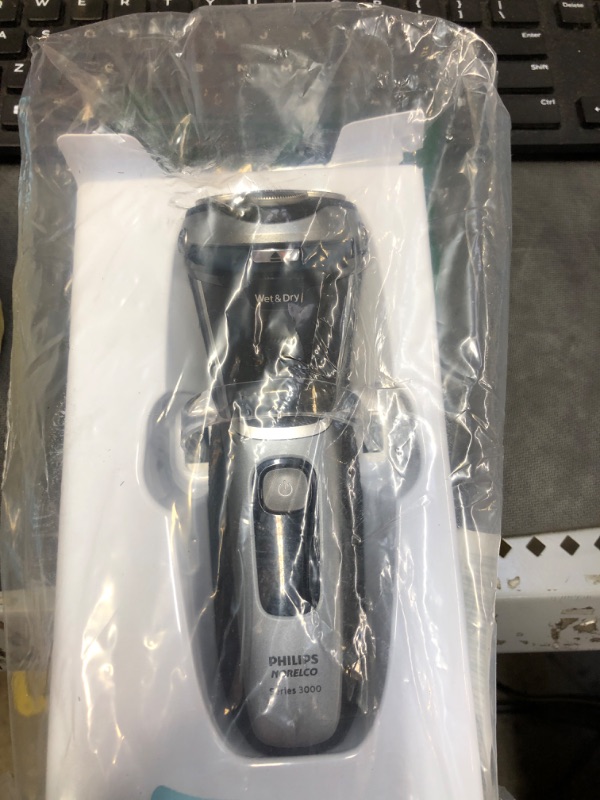 Photo 1 of Philips Norelco Shaver 3000, Rechargeable Wet & Dry Electric Shaver with Pop-Up Trimmer and Storage Pouch, S3212/82