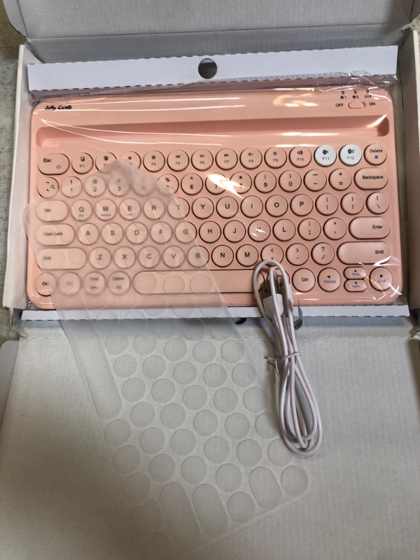 Photo 2 of Bluetooth Keyboard for iPad - Rechargeable Wireless Multi-Device Keyboard with Integrated Stand for iPad, MacBook, Phone, Tablet, Smart TV, iOS Android Windows (Pink)