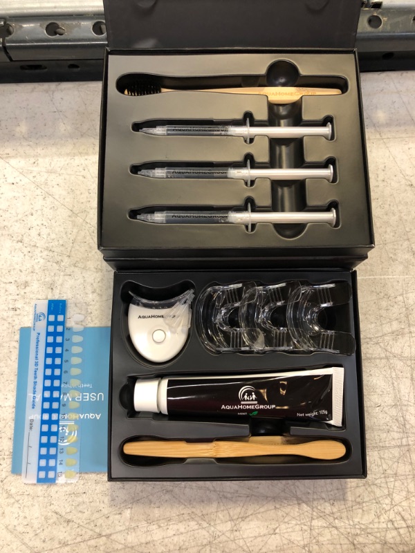 Photo 1 of Aquahomegroup Teeth Whitening Kit with LED Light and Gel - Set with Charcoal Toothpaste and Brushes - Tooth Whitening System All in One Carbamide Peroxide (Packaging May Vary)

