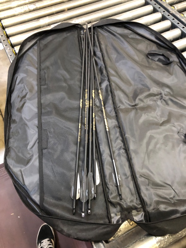 Photo 2 of 6 FLETCHED TORNADO ARROWS The Tornado Shaft was designed with speed in mind. It is a high modulus carbon standard diameter shaft (.244 ID), with low grains per inch, for the archer who...-----COLOR BLACK AND WHITE 
