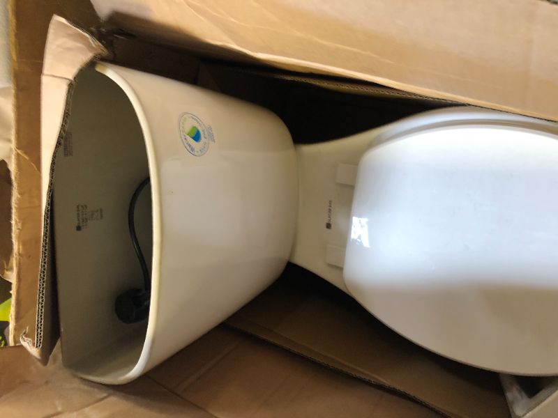 Photo 2 of 2-piece 1.1 GPF/1.6 GPF Dual Flush Round Toilet in White