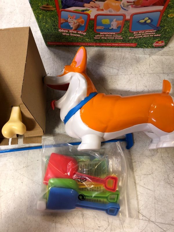 Photo 2 of Doggie Doo Corgi Game - Unpredictable Action - Feed The Doggie and Collect His Doo to Win - Includes 24-Piece Puzzle by Goliath