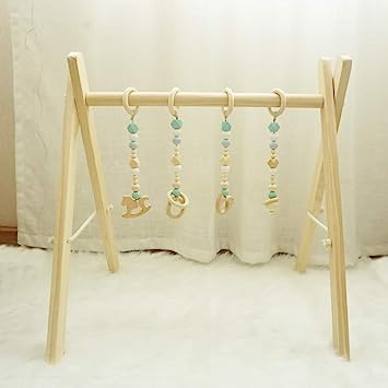 Photo 1 of Cynzia Baby Play Gym, Wooden Baby Gym with 4 Infant Toys, Foldable Wood Gyms Frame Hanging Bar for Toddler, Newborn, Baby Girls and Boys Shower Gift Play Toys