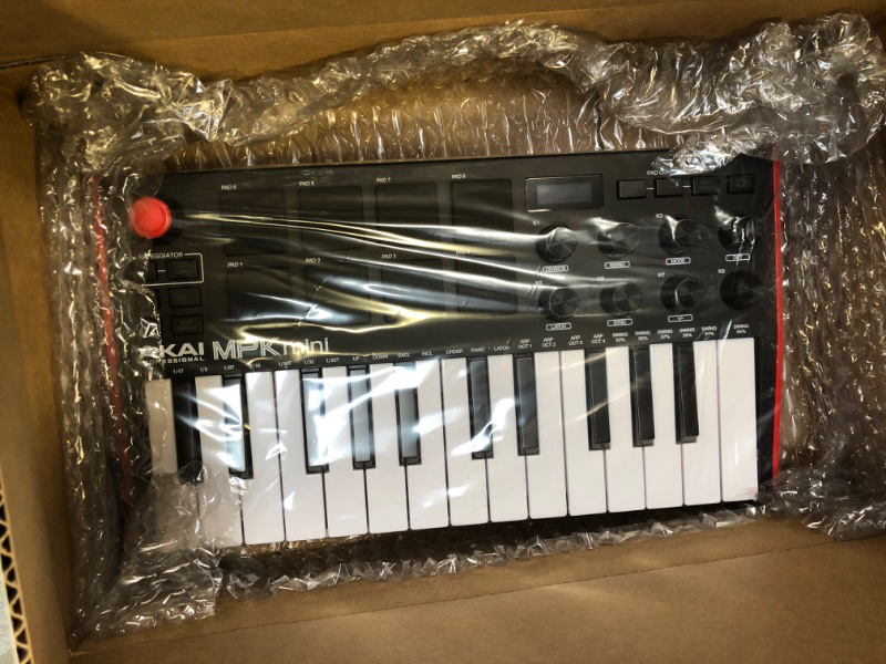 Photo 2 of AKAI Professional MPK Mini MK3 - 25 Key USB MIDI Keyboard Controller With 8 Backlit Drum Pads, 8 Knobs and Music Production Software Included
