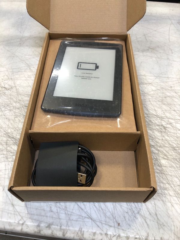 Photo 2 of Kindle Paperwhite E-Reader (Previous Generation – 2015 Release) - Black, 6" High-Resolution Display (300 ppi) with Built-in Light, Wi-Fi, Ad-Supported (Used)
