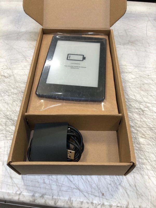 Photo 1 of Kindle Paperwhite E-Reader (Previous Generation – 2015 Release) - Black, 6" High-Resolution Display (300 ppi) with Built-in Light, Wi-Fi, Ad-Supported (Used)