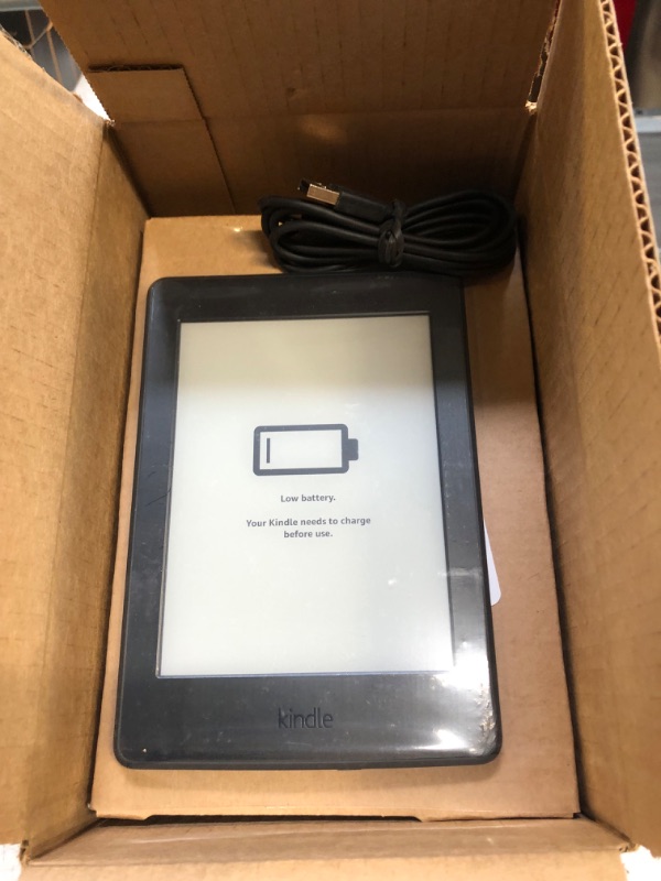 Photo 2 of Kindle Paperwhite E-Reader (Previous Generation – 2015 Release) - Black, 6" High-Resolution Display (300 ppi) with Built-in Light, Wi-Fi, Ad-Supported (Used)