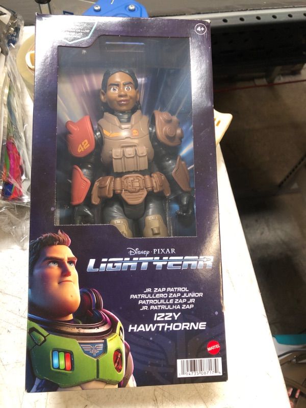 Photo 2 of Disney Pixar Lightyear Large Scale 12 Inch Scale Jr ZAP Patrol Izzy Hawthorne Action Figure, 14 Movable Joints, Movie Collectible Toy 4 Years & Up Jr. ZAP Patrol Izzy Hawthorne