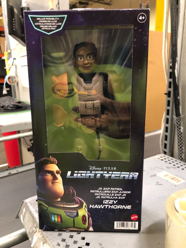 Photo 1 of Disney Pixar Lightyear Large Scale 12 Inch Scale Jr ZAP Patrol Izzy Hawthorne Action Figure, 14 Movable Joints, Movie Collectible Toy 4 Years & Up Jr. ZAP Patrol Izzy Hawthorne