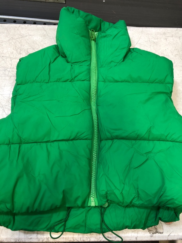 Photo 1 of Green puffer vest, size small