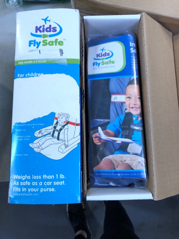 Photo 2 of Cares FAA Approved Airplane Harness for Kids - Toddler Travel Restraint Seat Belt - Provides Car Seat Safety for Children on Flights - Light Weight, Easy to Store and Installs in Minutes.