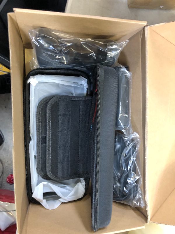 Photo 1 of Nintendo Switch Case and Accessories 