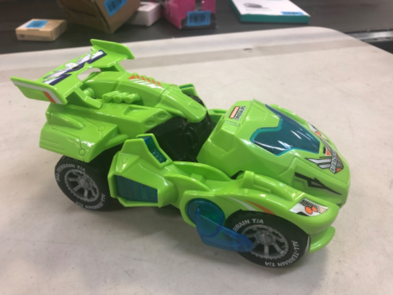 Photo 2 of HUWAIREN Toys for 3-6 Year Old Boys Transforming Car Toys with LED Light and Music Dinosaur Toy Birthday Gifts for 4 5 6 7 Year Old Boy (Green)