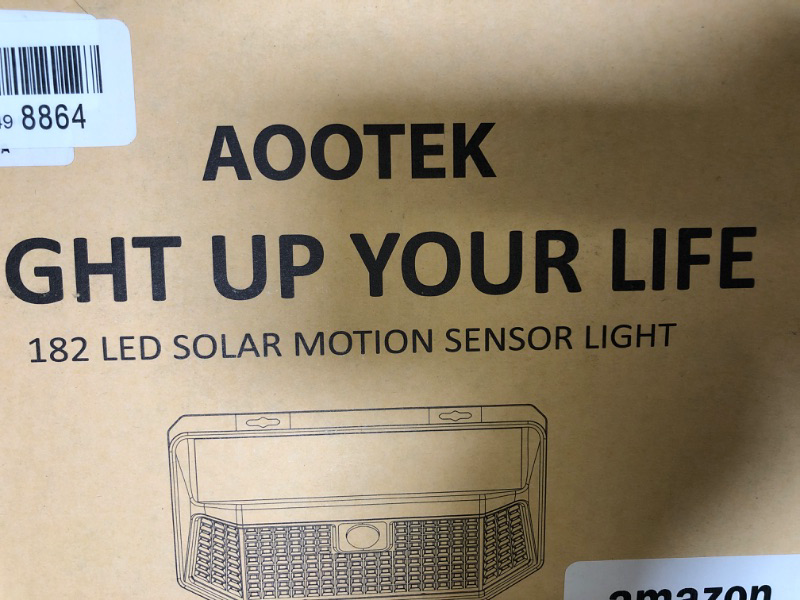 Photo 1 of Aootek New Solar Lights 120 LEDs with Lights Reflector,270° Wide Angle, IP65 Waterproof, Easy-to-Install Security Lights for Front Door, Yard, Garage, Deck (4 Pack)