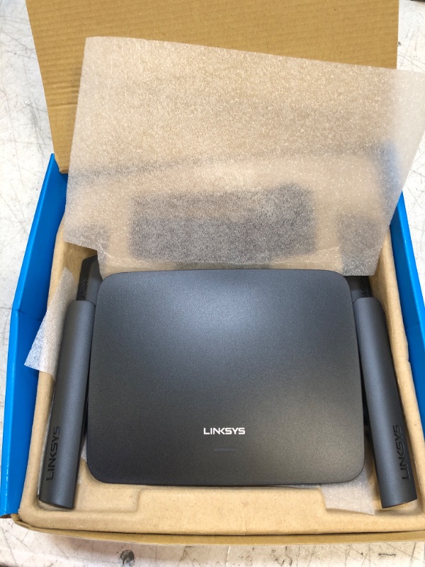 Photo 2 of Linksys RE9000: AC3000 Tri-Band Wi-Fi Extender, Wireless Range Booster for Home, 4 Gigabit Ethernet Ports, Works with Any Wi-Fi Router (Black) Wifi 5 RE9000 - 10,000 Sq. ft - 3000 Mbps