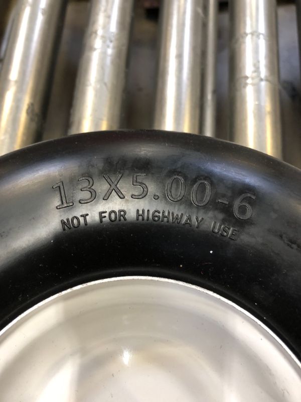 Photo 2 of 13x5 inch flat free tires 