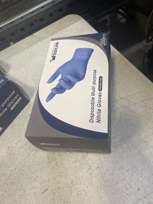 Photo 2 of Wostar Nitrile Disposable Gloves 4Mil Powder Latex Free Disposable Non-Sterile Nitrile Exam Gloves