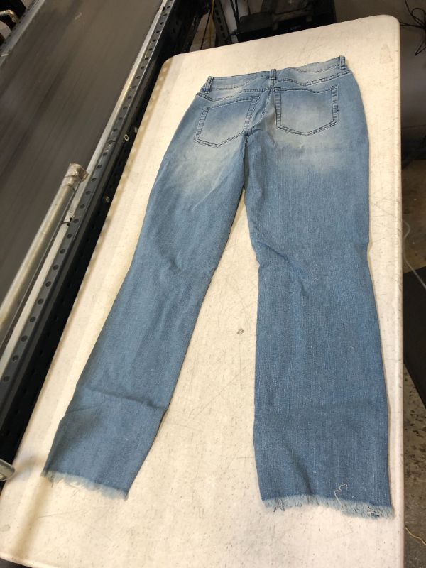 Photo 2 of DISTRESSED LIGHT BLUE JEANS SMALL 