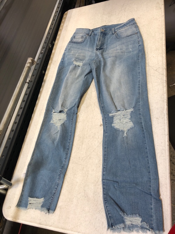 Photo 1 of DISTRESSED LIGHT BLUE JEANS SMALL 