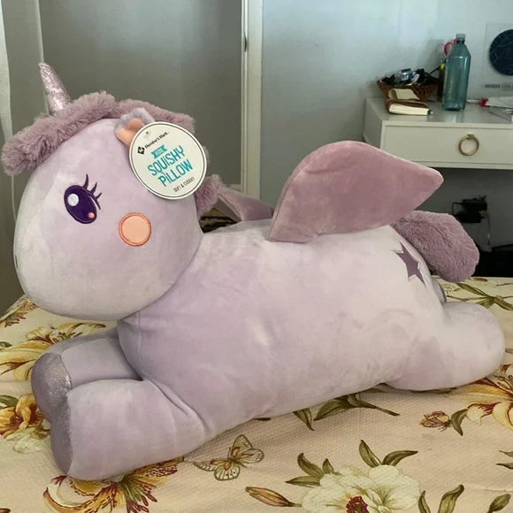 Photo 1 of Giant unicorn squish pillow