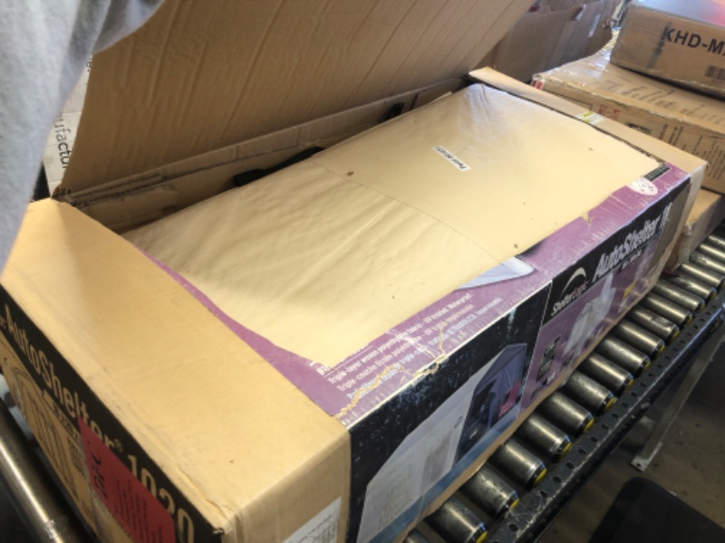 Photo 1 of ShelterLogic 10' x 20' x 8' All-Steel Metal Frame Peak Style Roof Instant Garage and AutoShelter with Waterproof and UV-Treated Ripstop Cover 10' x 20' x 8' Peak Garage and AutoShelter USED