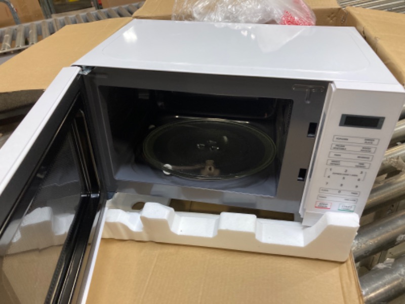 Photo 1 of 0.7 cu. ft. 700-Watt Countertop Microwave in White
