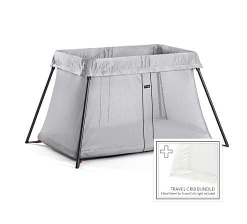 Photo 1 of BABYBJORN Travel Crib Light - Silver + Fitted Sheet Bundle Pack & Ubbi Disposable Diaper Pail Plastic Bags, Value Pack, 75 Count, 13-Gallon Bags Silver Travel Crib Light with Fitted Sheet + Bags