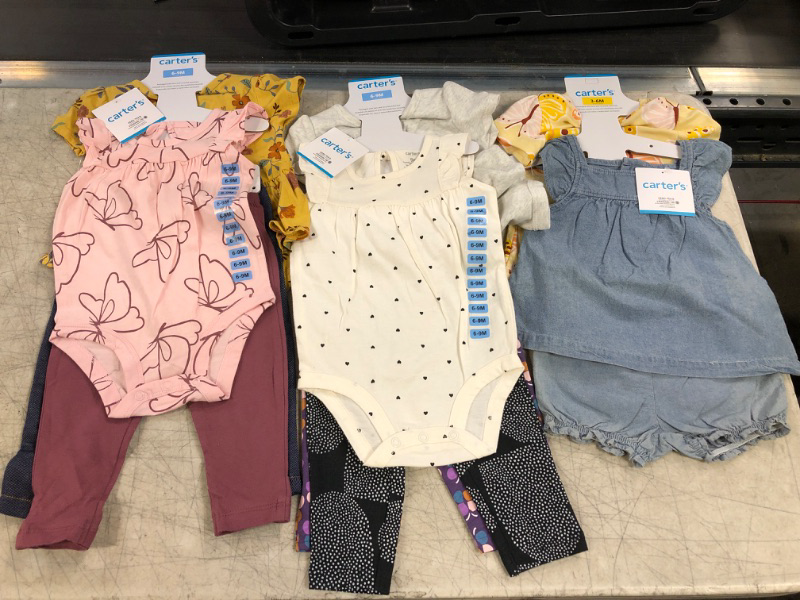 Photo 1 of BAG LOT- BABY GIRL CARTER SETS
SIZES-3-6 MONTHS/6-9 MOTNHS