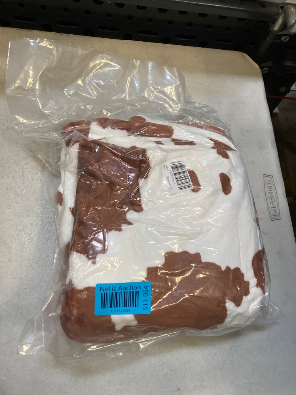 Photo 1 of Cow Print throw blanket ( sealed )