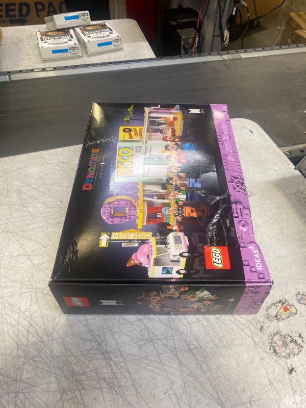 Photo 2 of LEGO Ideas BTS Dynamite 21339 Model Kit for Adults, Gift Idea for BTS Fun with 7 Minifigures of The Famous K-pop Band, Features RM, Jin, SUGA, j-Hope, Jimin, V and Jung Kook (factory sealed, damaged box)