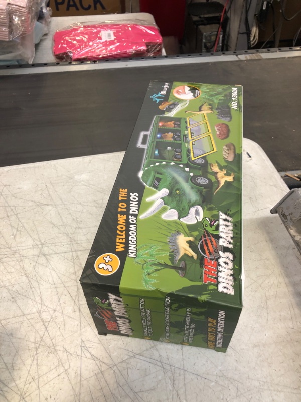 Photo 1 of BLUEJAY 21 Pack Dinosaur Toys for Kids 3-7, Dinosaur Truck with Oversized Dinosaur Map, Flashing Lights, Music and Roaring Sound, Kids Toys with 6 Pull Back Dinosaur Cars, 6 Dinosaur Toys (Brown) Brown2