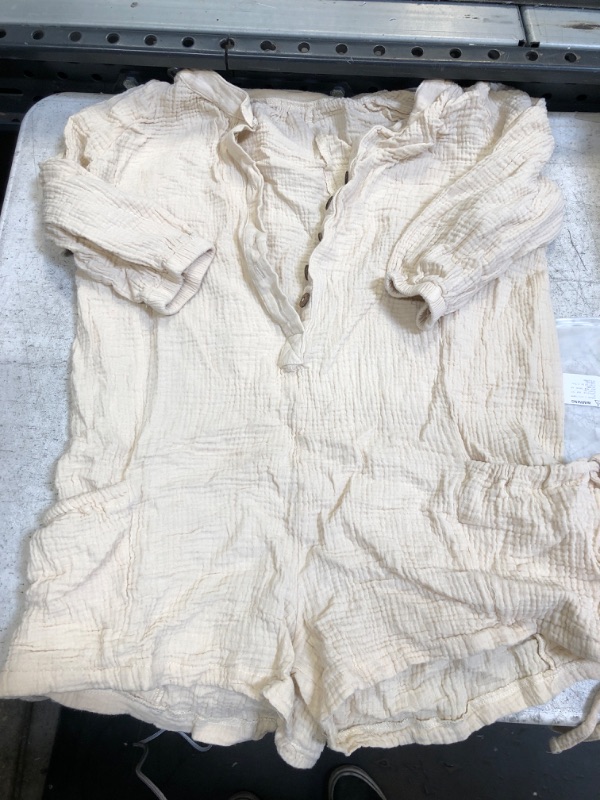 Photo 1 of Beige Romper Medium