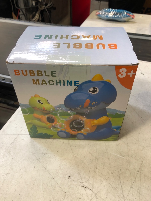 Photo 1 of BUBBLE MACHINE TOY