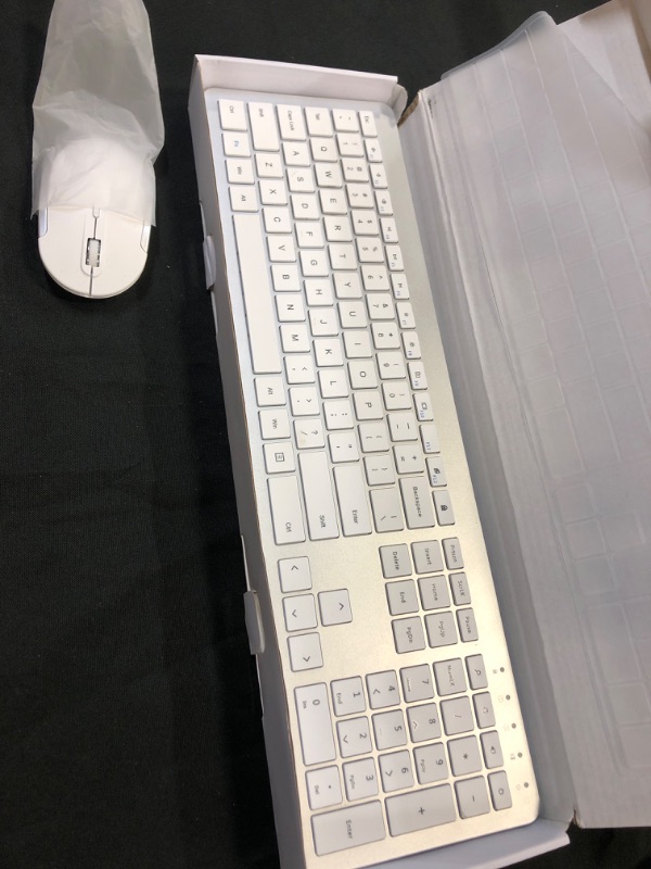 Photo 2 of Wireless Keyboard and Mouse Combo - Full Size Slim Thin Wireless Keyboard Mouse with Numeric Keypad with On/Off Switch on Both Keyboard and Mouse - White & Silver Silver and white keyboard mouse