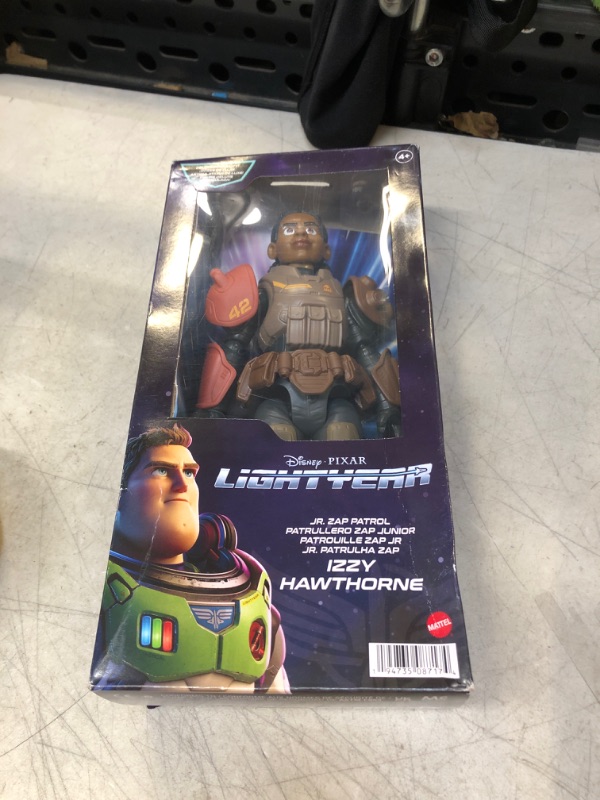 Photo 2 of Disney Pixar Lightyear Large Scale 12 Inch Scale Jr ZAP Patrol Izzy Hawthorne Action Figure, 14 Movable Joints, Movie Collectible Toy 4 Years & Up Jr. ZAP Patrol Izzy Hawthorne