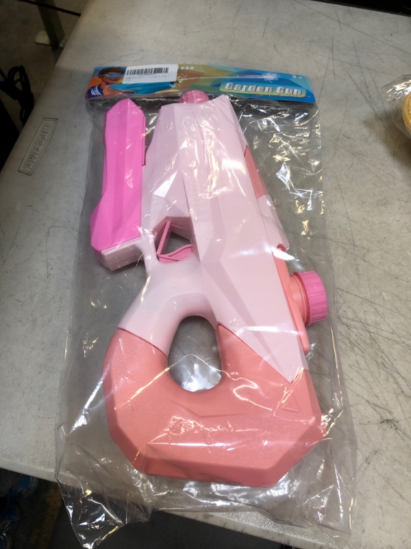 Photo 1 of  PINK WATER GUN 