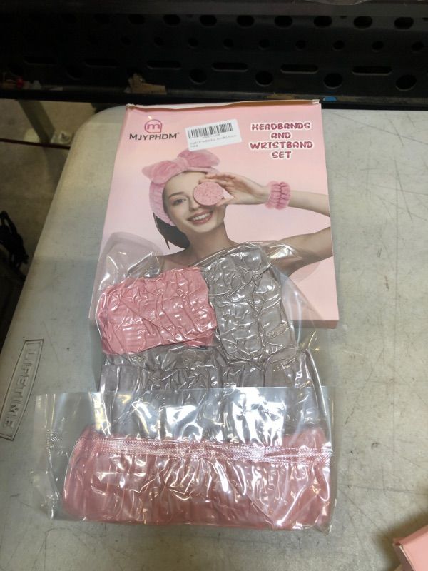 Photo 1 of 2 PINK HEADBANDS WITH GREY WRIST TOWELS
