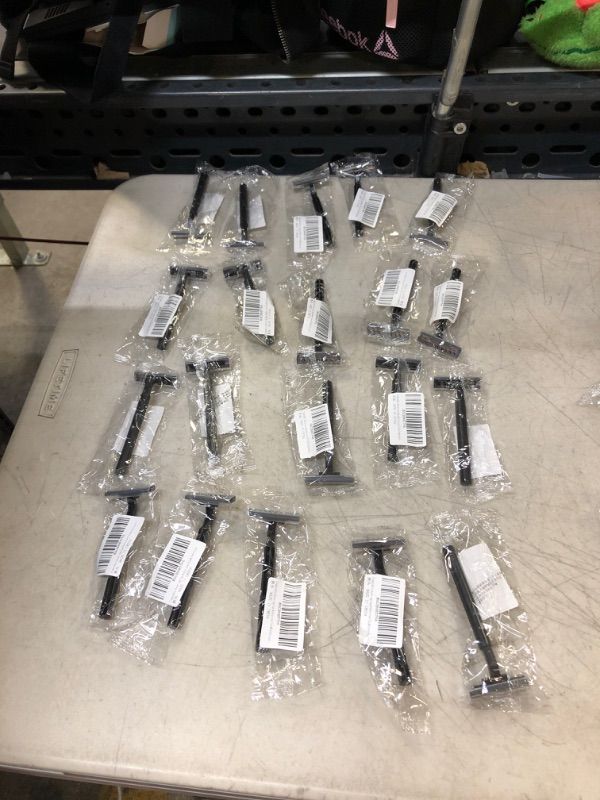 Photo 1 of ( 20 PCS ) Disposable shaver opp bag double steel blade bath razor.