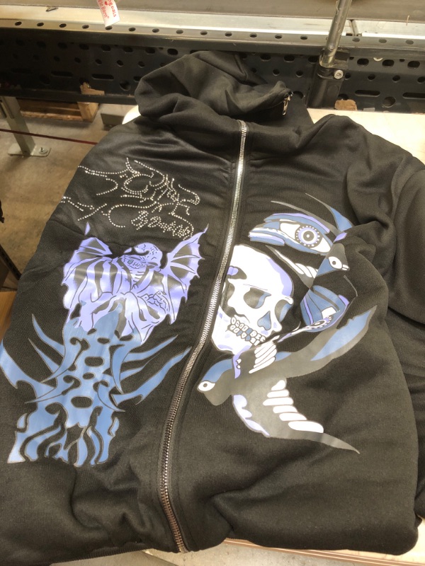 Photo 1 of BLACK AND BLUE SKULL ZIPPER JACKET ( SIZE: MED) 