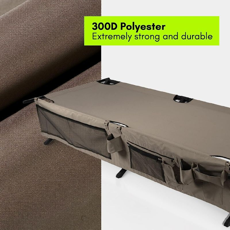 Photo 5 of Extremus New Komfort Camp Cot, Folding Camping Cot, Guest Bed, 300 lbs Capacity, Steel Frame, Strong 300D Polyester Surface, Includes Side Storage Organizer, Carry Bag, 75” Long x 35” Wide x 17” Tall
