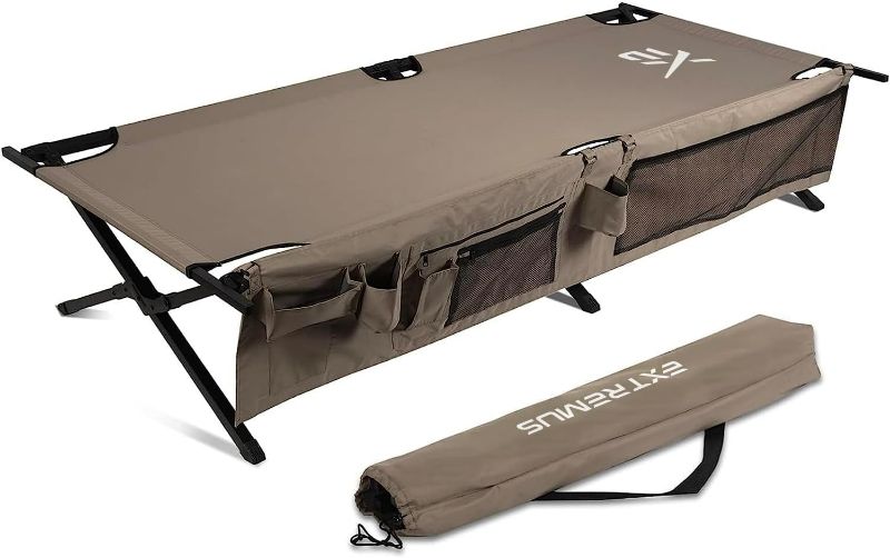Photo 1 of Extremus New Komfort Camp Cot, Folding Camping Cot, Guest Bed, 300 lbs Capacity, Steel Frame, Strong 300D Polyester Surface, Includes Side Storage Organizer, Carry Bag, 75” Long x 35” Wide x 17” Tall
