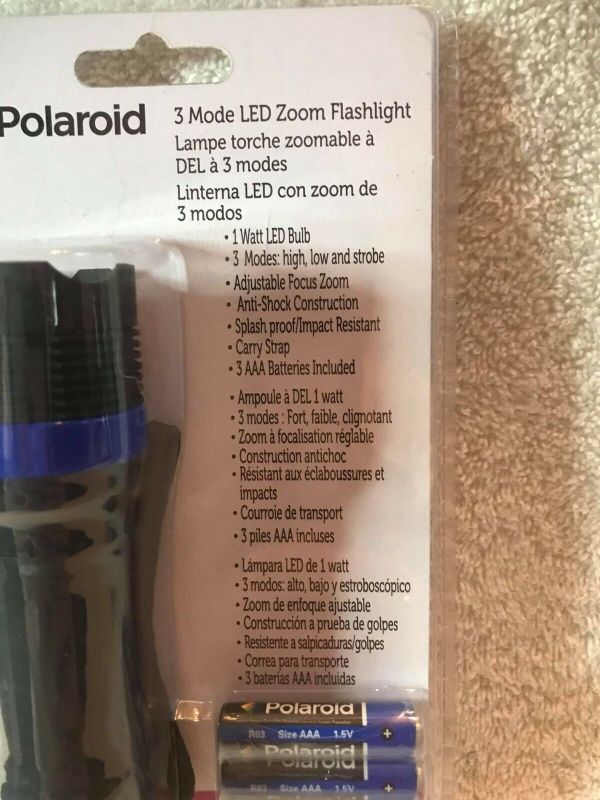 Photo 1 of Polaroid 3 Mode Led Zoom Flashlight Black/Red W/ Batteries J1
