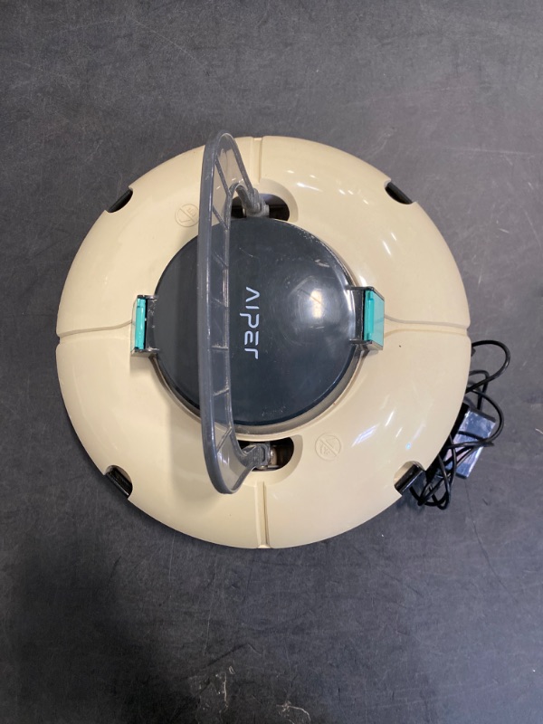 Photo 4 of AIPER-  Cordless Robotic Pool Cleaner, Auto Dock Self Parking w/Dual-Drive Motors, Lightweight, IPX8 Waterproof, Perfect for Above-Ground/In-Ground Flat...ITEM IS USED/ MAY BE MISSING PARTS
