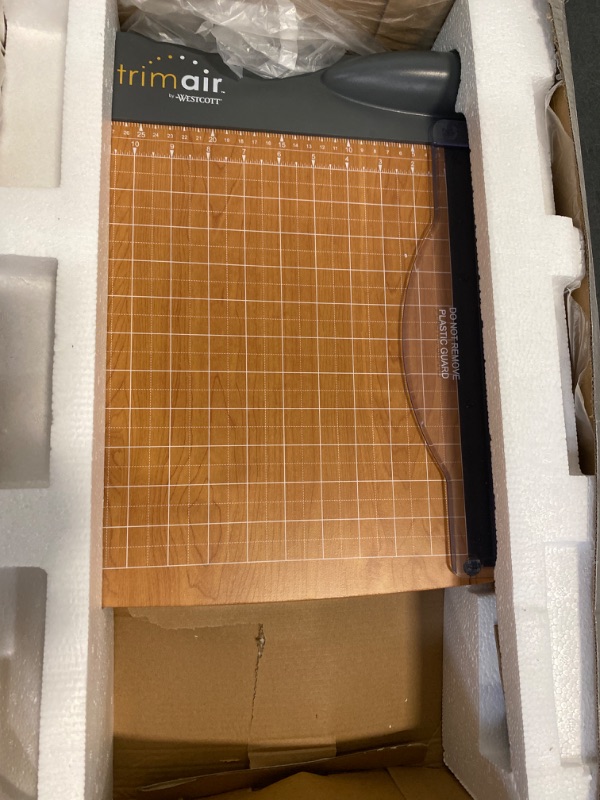 Photo 4 of Westcott ?15106 TrimAir 12-Inch Guillotine Paper Cutter, Heavy-Duty Multi-Paper Trimmer with 30 Sheet Capacity-ITEM IS NEW BUT  MAY BE MISSING PARTS

