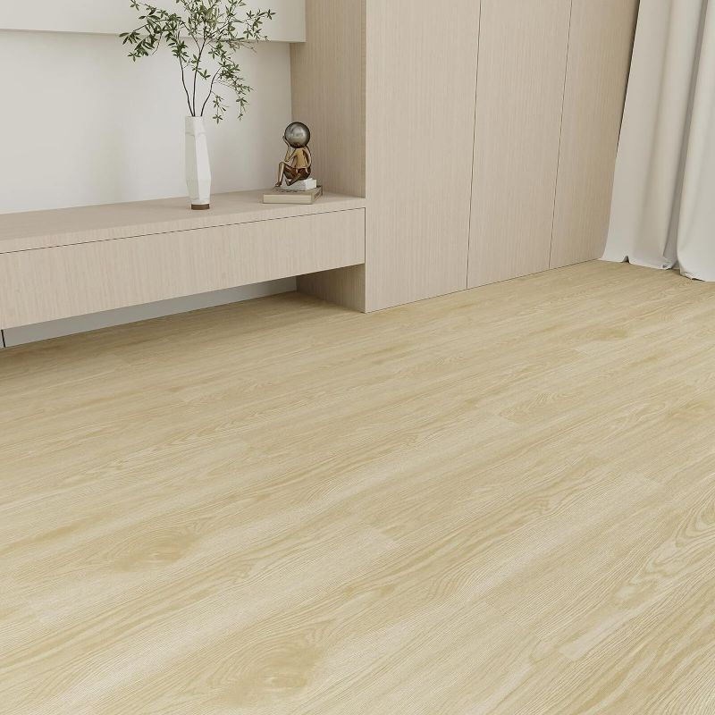 Photo 2 of Mysflosy Peel and Stick Floor Tiles, Self-Adhesive Luxury Vinyl Flooring Plank,6x36inch 36pack 54 Sq.Ft, Waterproof DIY Deep Wood Grain Planks Easy to Install for Kitchen, Living Room, Light Brown-ITEM IS NEW BUT  MAY BE MISSING PARTS

