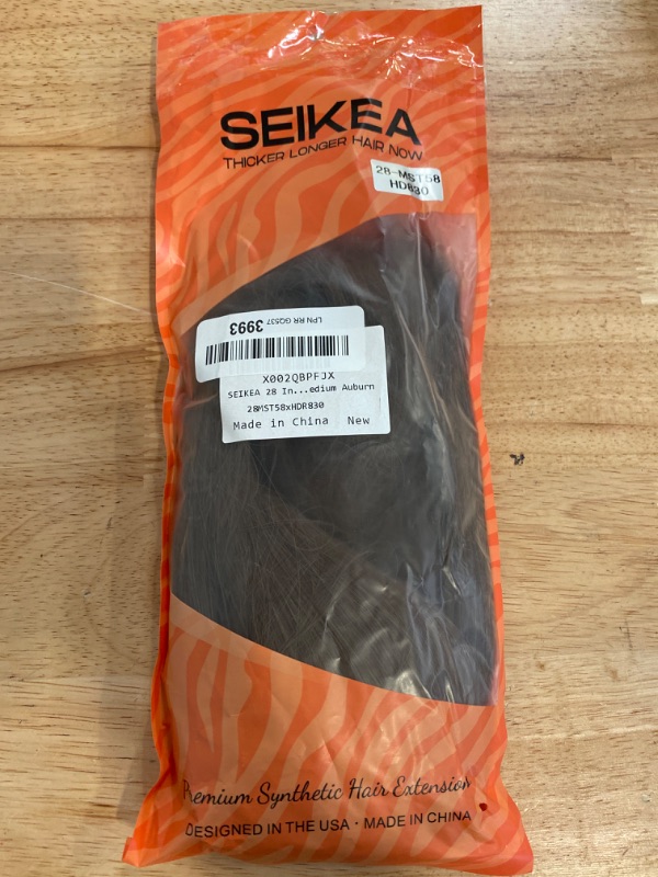 Photo 4 of SEIKEA 28" Ponytail Extensions Drawstring Long Straight Fake Pony Tail Natural Soft Clip in Hair Extension Synthetic Heat Resistant Hairpiece - Medium Auburn
