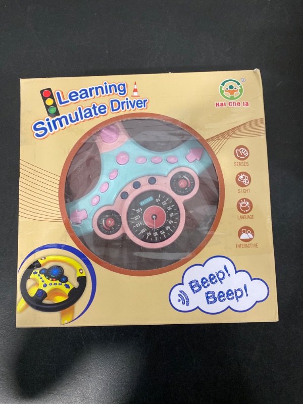 Photo 4 of XHSP Steering Wheel Toy with Lights Music, Simulated Driving for Toddlers Pretend Play Toy Adsorption Driving Wheel for Kids (Style 2)
